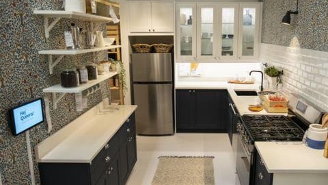 a kitchen with a stove a sink and a microwave