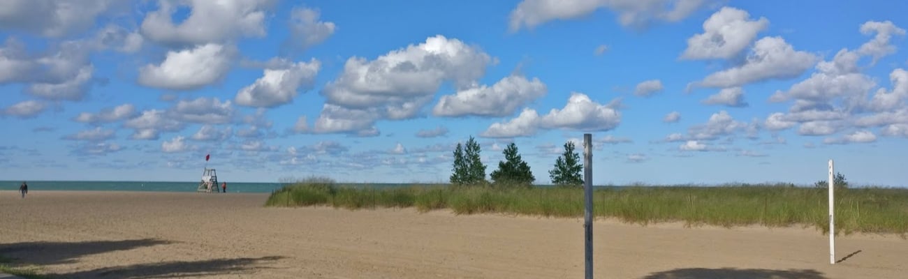 a person walking down a dirt road