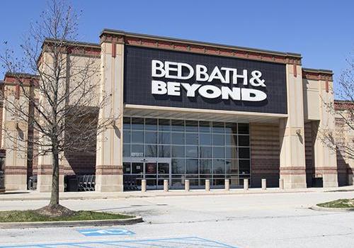 a sign in front of a building