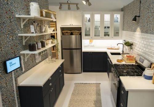 a kitchen with a stove a sink and a microwave